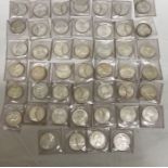 Forty six Canadian uncirculated silver dollars pre 1967. 80% silver.