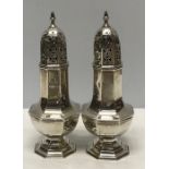 Two silver sugar shakers. Sheffield 1900. 187.2gms.