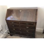 An 18th century mahogany bureau with secret drawers to interior.