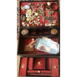 A 19th century sewing box and contents including jewellery and silver.
