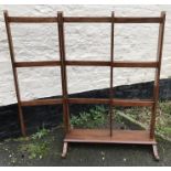 Edwardian mahogany towel rail with to swing out racks. 100cms h.