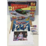 Signed Gerry Anderson Thunderbirds vehicle set (signed inside lid) and signed print, 5-4-3-2-1