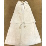 A 19thC child's christening cape with fine silk embroidery.