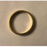 A 22ct gold wedding band. 2.8gms, size K/L