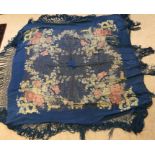 Blue floral and gold thread long fringed shawl.