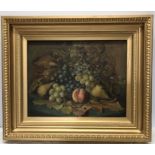 Gilt framed oil painting on canvas. Still life, fruit, signed indistinctly on the back. 36 h x 46cms