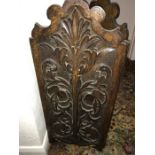 Two fold carved oak firescreen.