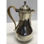 A London silver coffee pot, 1908, 25cms, C.S Harris and Sons Ltd, 600gms total weight. damage to