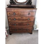 A 19th century mahogany bow fronted chest of drawers. 2 short over 3 long drawers on bracket feet.