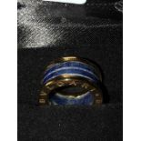 Ladies dress ring marked Bvlgari. Size L. marked to inside Bvlgari 750 made in Italy AN852405.