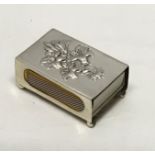 Silver match holder decorated with lilies, Chester 1905. 17.3gms approx. 6 l x 4cms w.