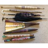 Various vintage umbrellas and parasols including 1960's umbrella with gilt handle, lilac umbrella