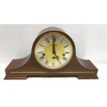 A Westminster chiming mantle clock.
