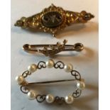 Three brooches, 19thC 9ct, 1 unmarked, 1 9ct and seed pearl. 7gms total.