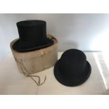 Record make Bowler hat, size 7.25 and a Cristys London top hat with retail box. Size to bowler