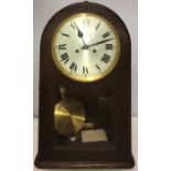 Oak cased wall clock with arched top. 59cms h.