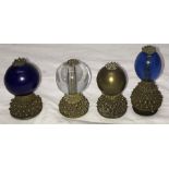 Four Qing Dynasty glass and metal mandarin hat knobs/buttons. 6.5cms tallest.