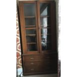 Edwardian mahogany 2 door glazed bookcase on chest of drawers to base, 2 short over 2 long