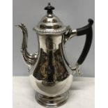 Silver coffee pot with ebony handle & knop, marks rubbed. 26cms h, 564gms.