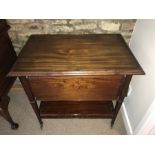 Mahogany tea trolley with pull out shelves on brass castors., some loss to beading. 76 w x 51 d x