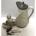 A miscellany including good quality plated cruet set on wheels, silver topped blue glass scent,