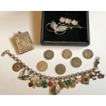 Silver 800 stamp holder, 800 silver charm bracelet with 15 charms, 6 x 3pences and a silver 925