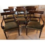 A set of 8 Regency bar back mahogany dining chairs.