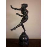 A 20th century bronze figure of a naked female after Claire Colinet. 47cms h.