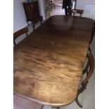 A 19thC mahogany wind out dining table with 2 leaves. 236cms l (extended) 120cms w. (leaves 47.