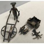 Chinese silver miniatures. Man with rickshaw and a small cart pulled by dogs. 3.5cms h x 4.5cms l.