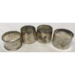 Four hallmarked silver napkin rings, approx 115gms.