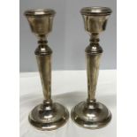 Pair tall hallmarked silver candlesticks 21cms h, Birmingham 1973/74.
