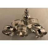 Silver napkin rings and pepperette. 89.7gms.