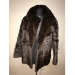 Ladies waist length fur coat, a/f to back, 63cms long, 49cms armpit to armpit.