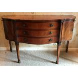 Reproduction mahogany serpentine fronted sideboard.