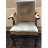 Good quality early 20thC upholstered mahogany armchair on ball and claw feet.