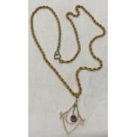 A 9ct gold pendant on 9ct gold rope twist chain, 6.4gms total, 25cms l.