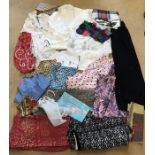 A quantity of vintage blouses, skirts, scarves etc.