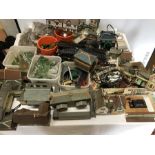 A large quantity of vintage cardboard buildings, track and train set related items including
