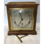 Oak cased Elliot mantle clock, Westminster chimes, retailer F Benoy Nantwich.