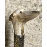 Walking cane with carved horn handle in the form of a greyhound with glass eyes, approx 92cms l.