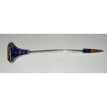 A yellow and blue sapphire nail head stick pin by Cartier, early 20thC set in platinum and gold,