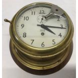 Smiths Empire ships bulkhead type clock cream dial with subsidiary seconds mounted on wooden