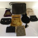 Seven various early 20thC evening bags, some beaded, a 1940's black handbag and a prayer book in