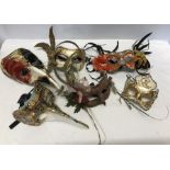 Six various Venetian masks.