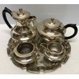 A four piece plated tea service on tray.