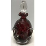 A mid century Swedish Aseda art glass decanter, ruby red glass with clear glass stopper, small knock
