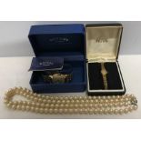 A boxed gentleman's Rotary wristwatch with an Avia ladies wristwatch and a faux pearl necklace.