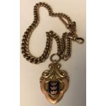 A 9ct gold watch chain with 9ct gold medallion with Hull crest. 47.4gms total.