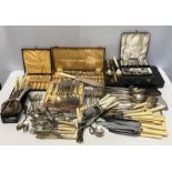 A large quantity of silver plated cutlery, some cased.